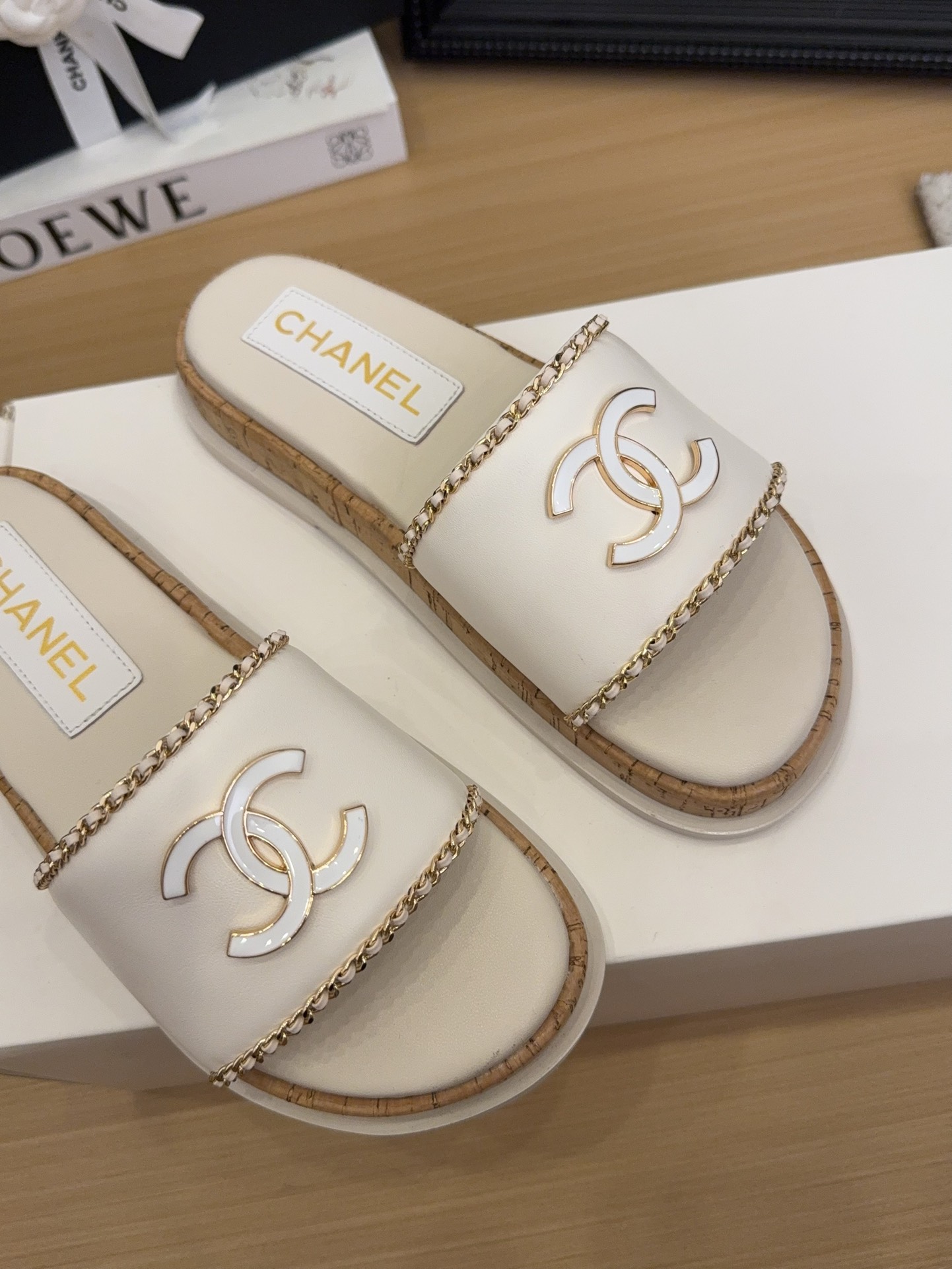Elegant Chanel Women's White Leather Slides with CC Logo & Chain Detail 4 i1744209384 6485 5