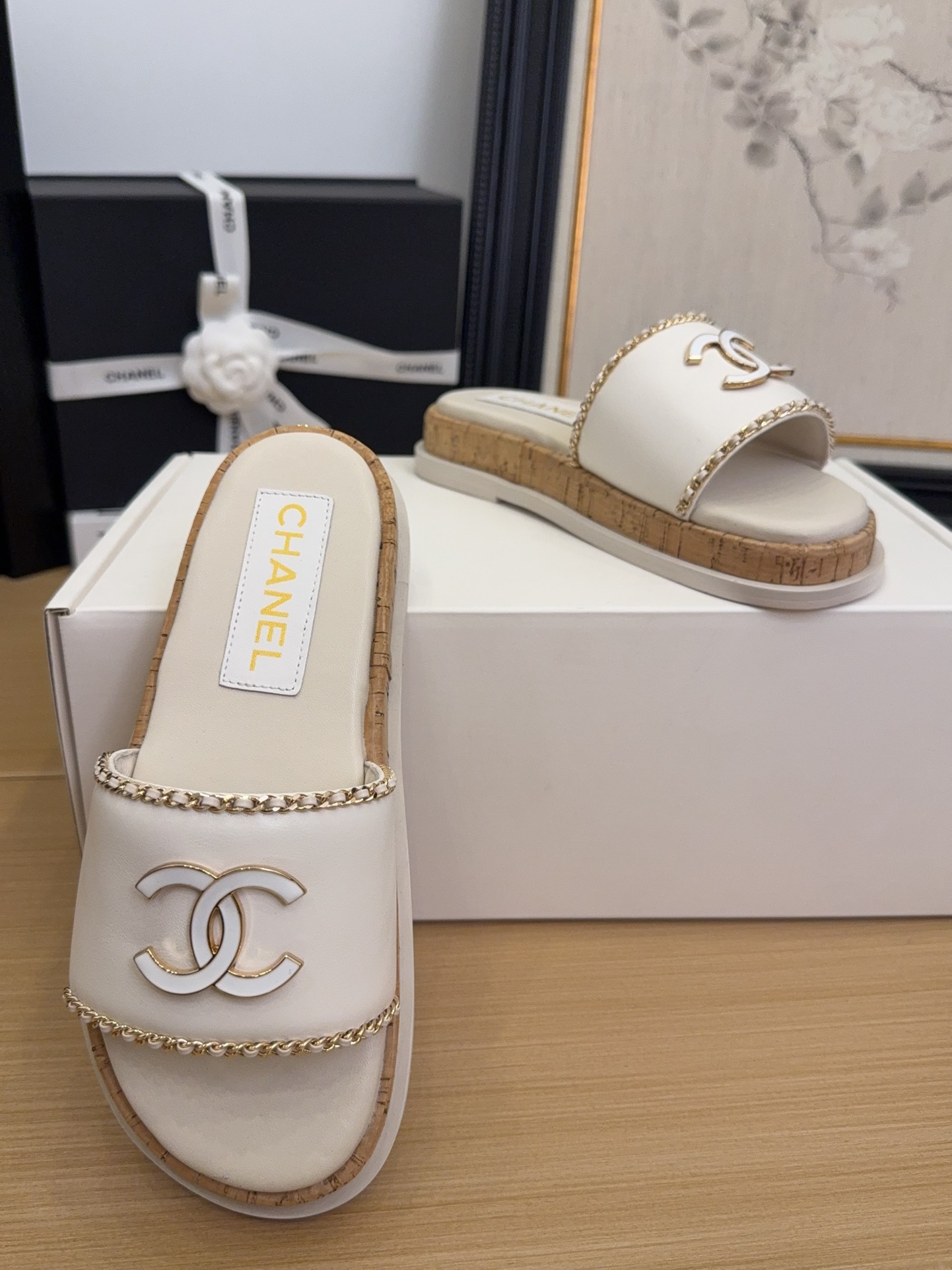 Elegant Chanel Women's White Leather Slides with CC Logo & Chain Detail 8 i1744209384 8886 0