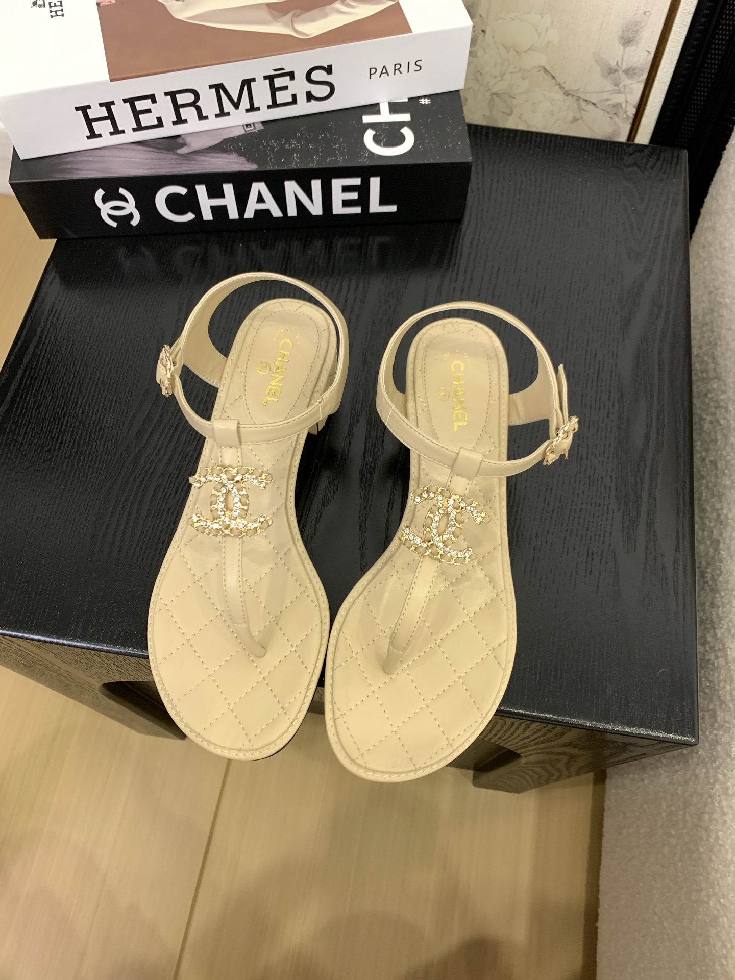 Chanel Women's Thong Sandal with Pearl CC Logo, Beige Leather 1 Chanel Women's Thong Sandal with Pearl CC Logo, Beige Leather