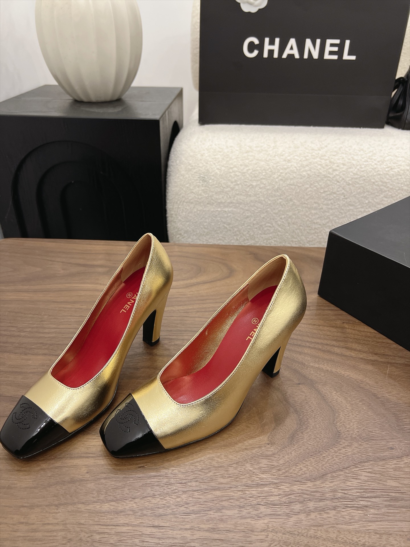 Chanel Gold Cap-Toe Pumps
