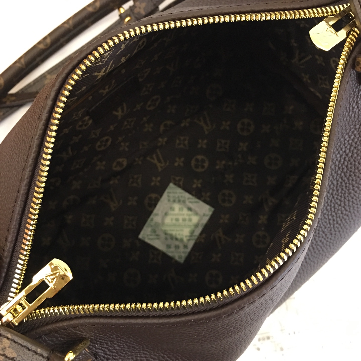 Louis Vuitton Express Small Handbag in Brown Leather with Monogram Trim 10 i1756318656279 4073 0 8