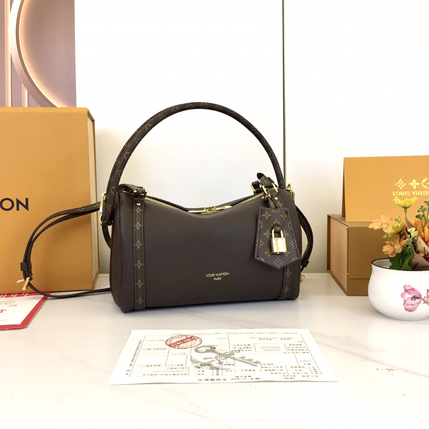 Louis Vuitton Express Small Handbag in Brown Leather with Monogram Trim 5 i1756318656887 5899 0 3