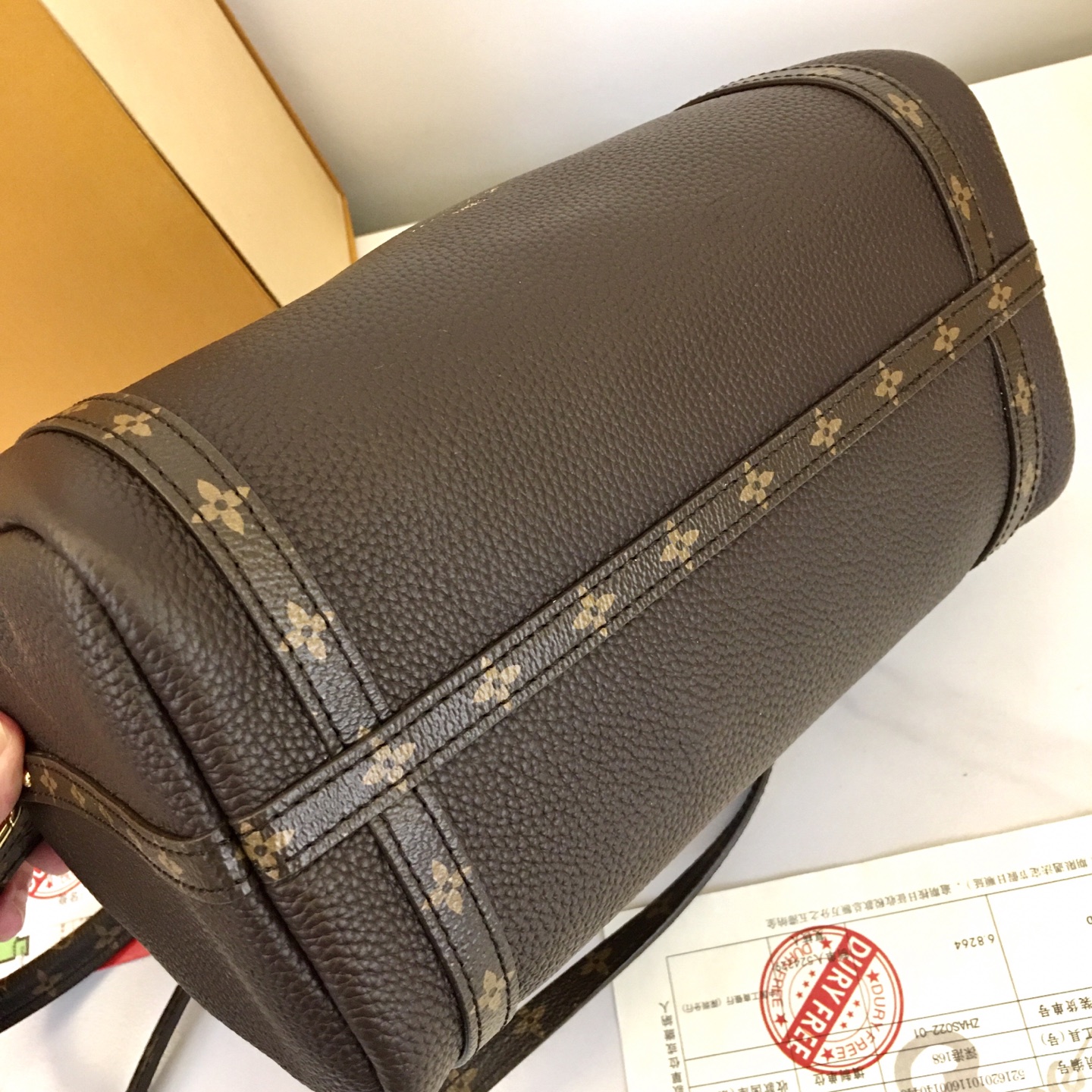 Louis Vuitton Express Small Handbag in Brown Leather with Monogram Trim 8 i1756318656978 9407 0 6
