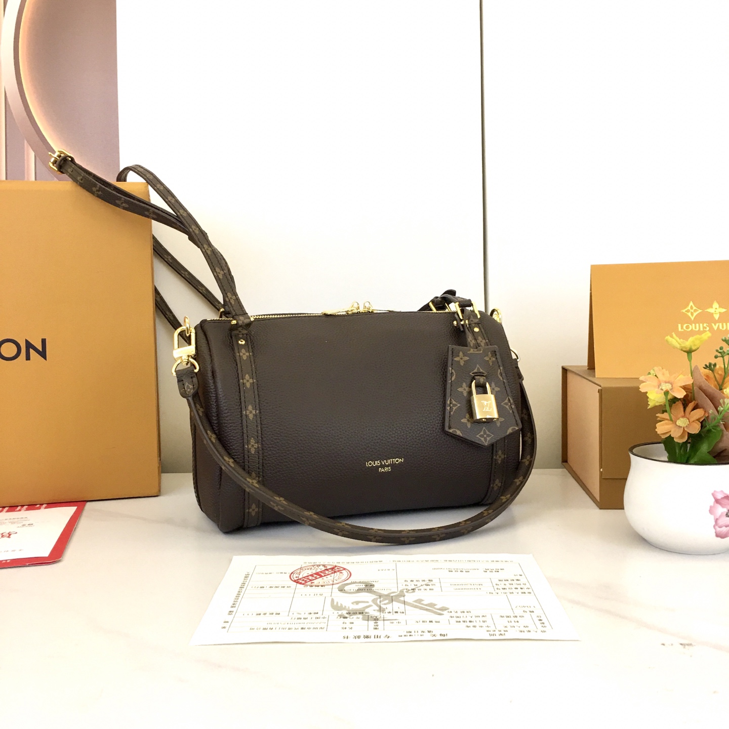 Louis Vuitton Express Small Handbag in Brown Leather with Monogram Trim 3 i1756318663340 189 0 1