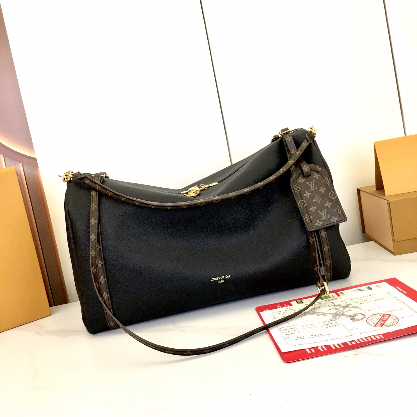 Louis Vuitton Express Travel Bag: Black Leather, Monogram Accents, Large Size 3 i1757697519657 1047 0 1