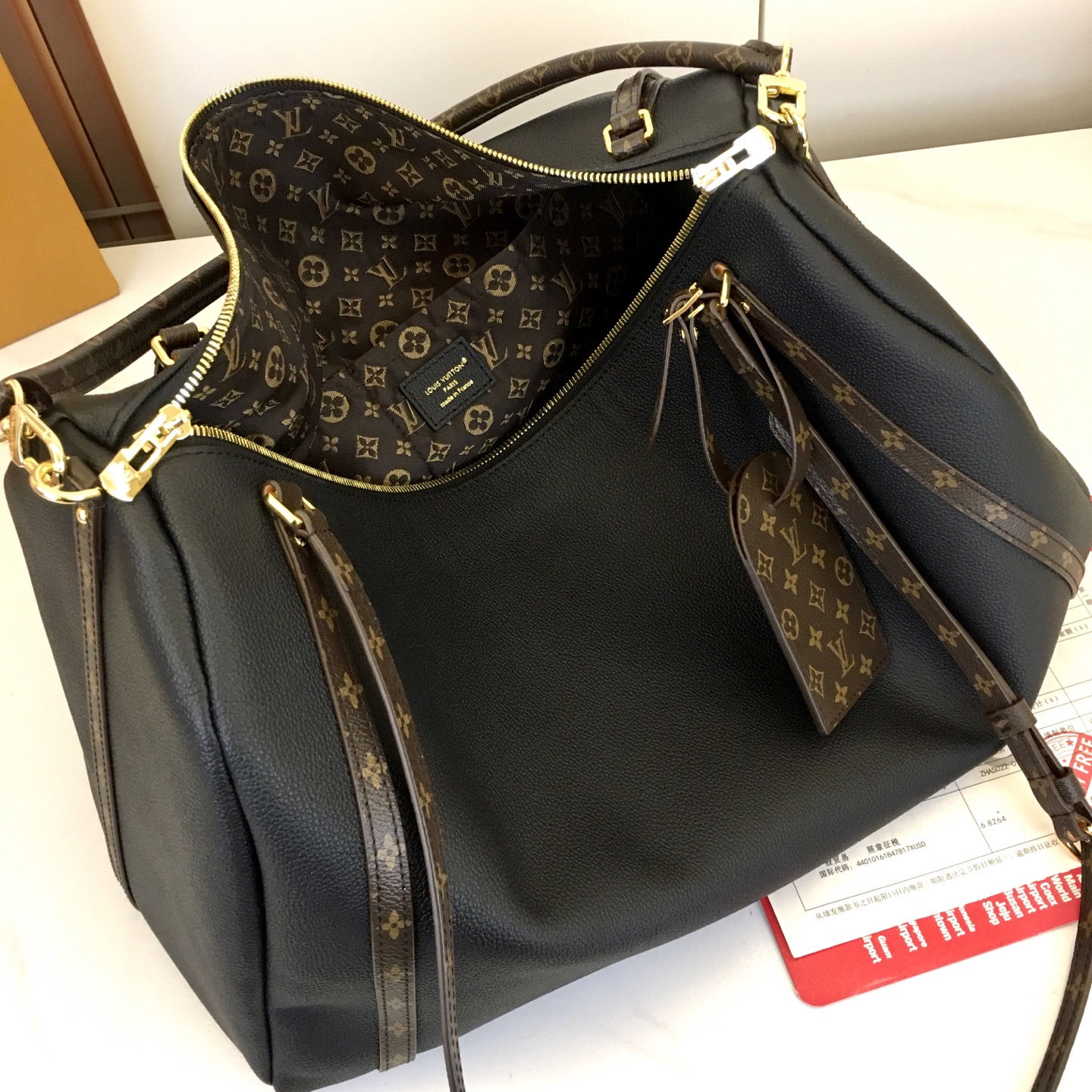 Louis Vuitton Express Travel Bag: Black Leather, Monogram Accents, Large Size 8 i1757697519684 1344 0 6