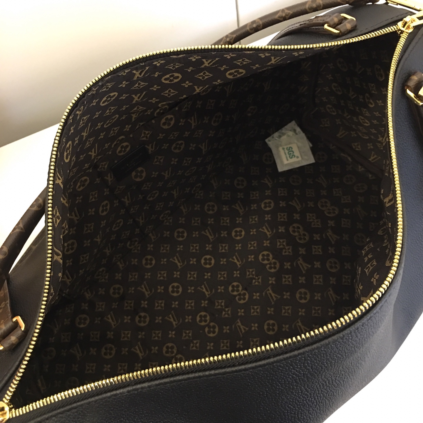 Louis Vuitton Express Travel Bag: Black Leather, Monogram Accents, Large Size 10 i1757697528541 8608 0 8