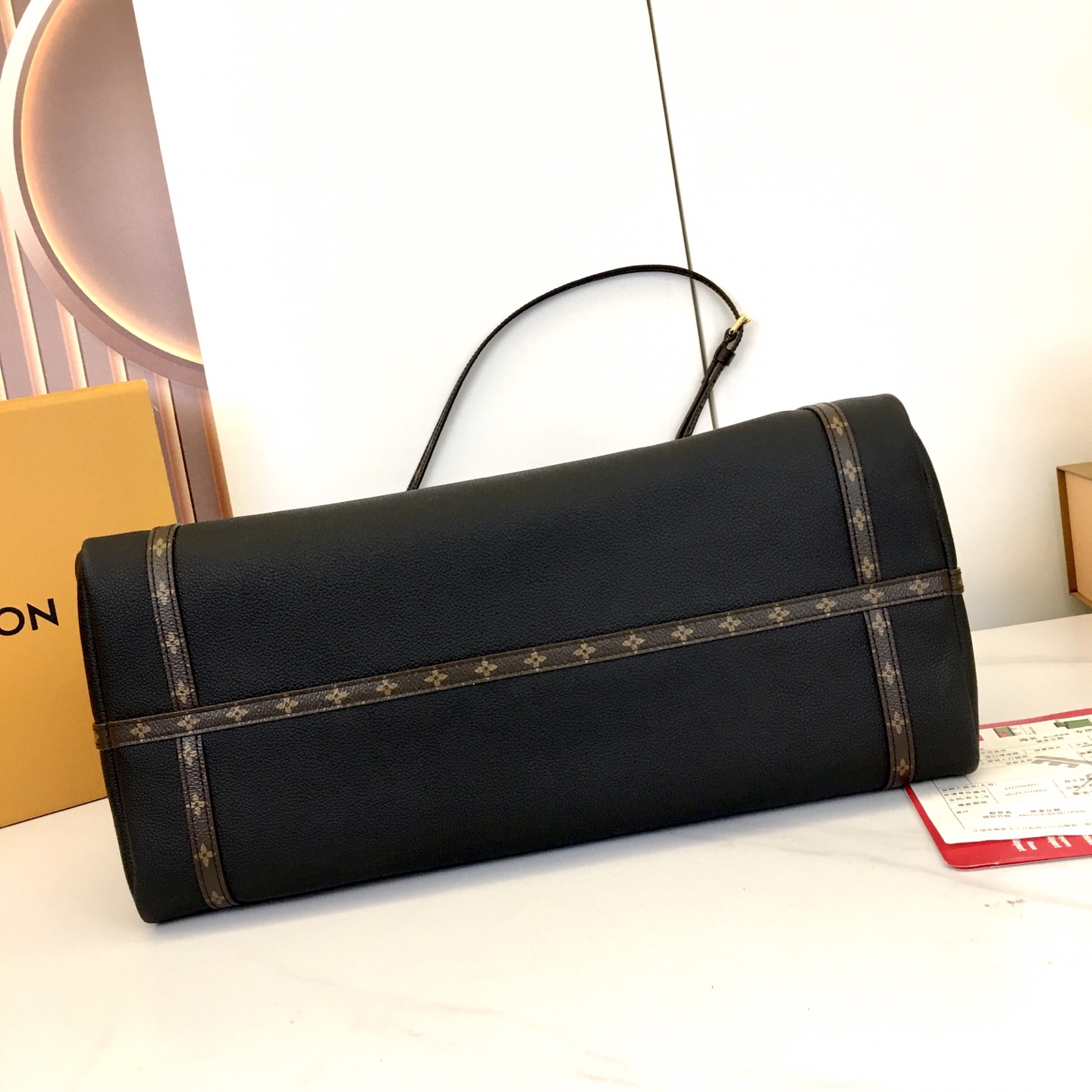 Louis Vuitton Express Travel Bag: Black Leather, Monogram Accents, Large Size 7 i1757697528724 322 0 5