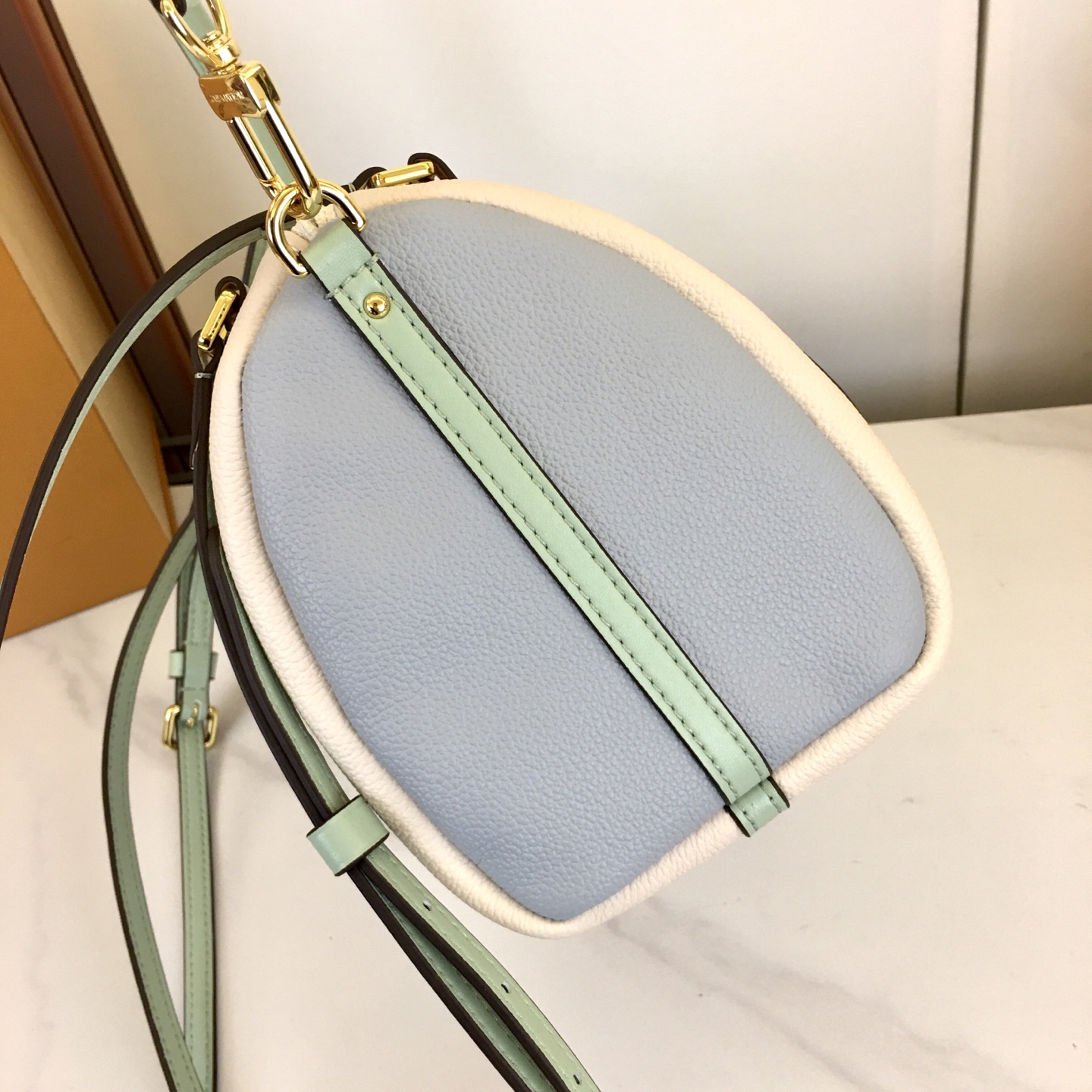 Louis Vuitton Express Small Handbag in White Leather with Mint Accents 5 i1758042577622 666 0 3