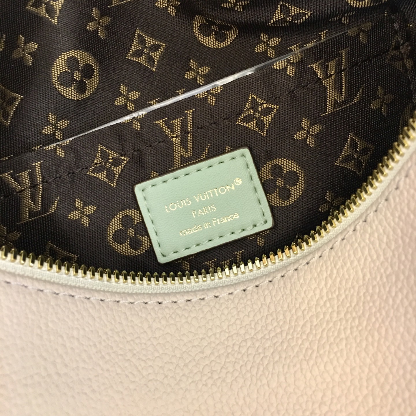 Louis Vuitton Express Small Handbag in White Leather with Mint Accents 9 i1758042577622 9047 0 8