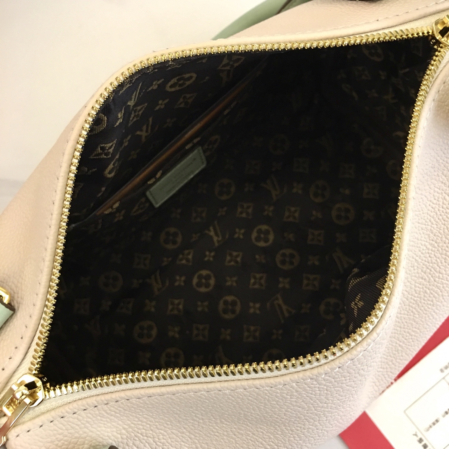 Louis Vuitton Express Small Handbag in White Leather with Mint Accents 10 i1758042582497 9438 0 7