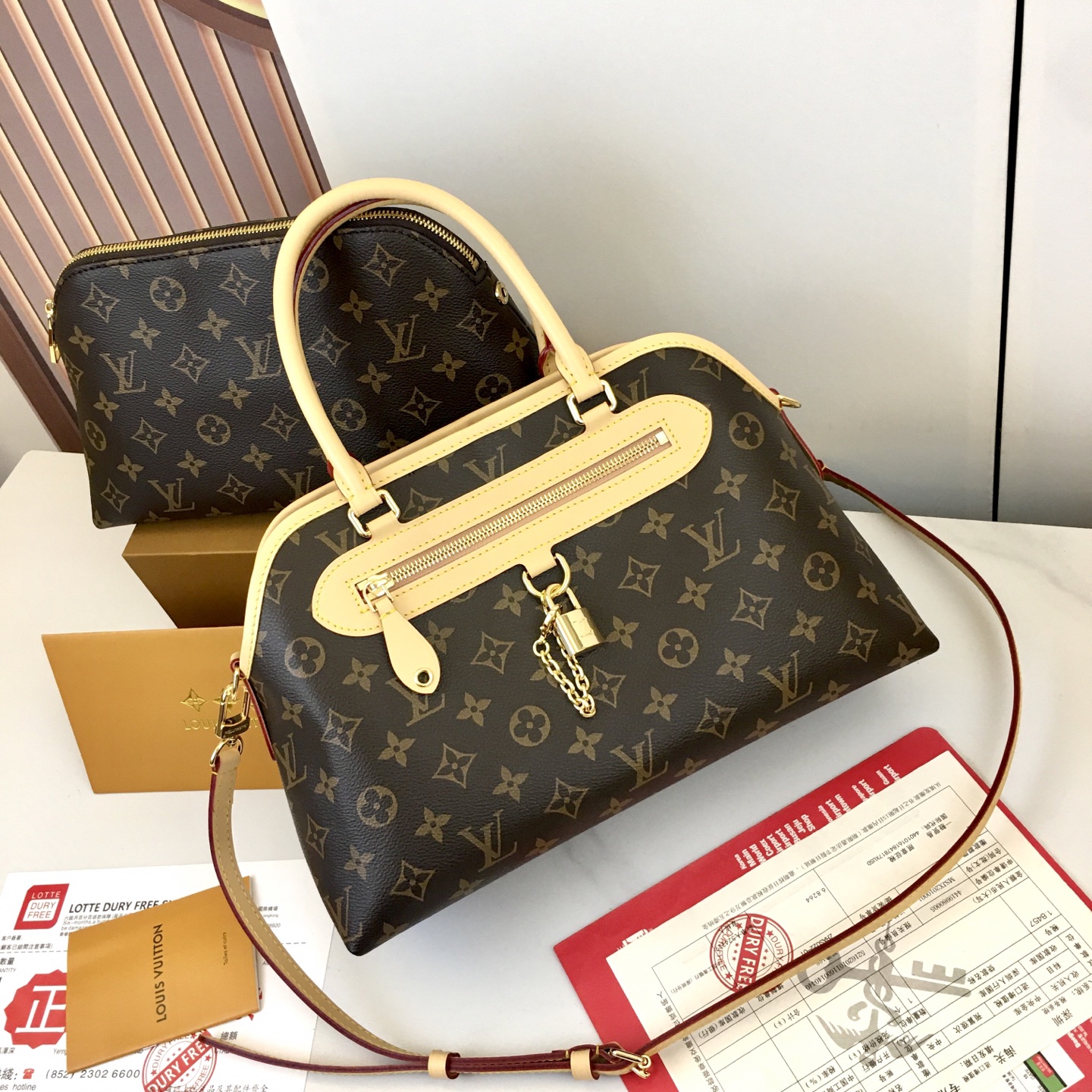 Louis Vuitton Ever More Small Handbag in Monogram Canvas with Gold Chain 3 i1758818741553 5740 0 2