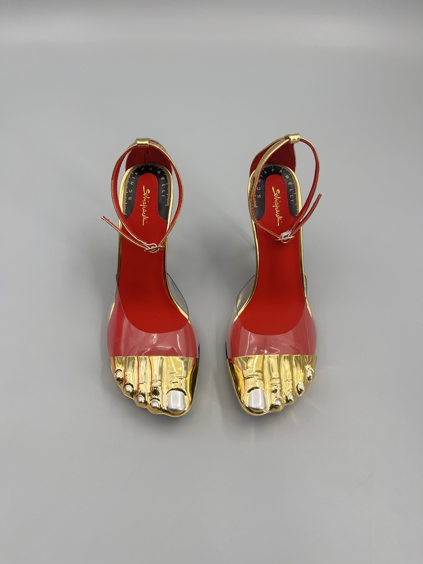 Schiaparelli FW24 Garment Show Highlights: Golden Toe Heels and Real Gold Details