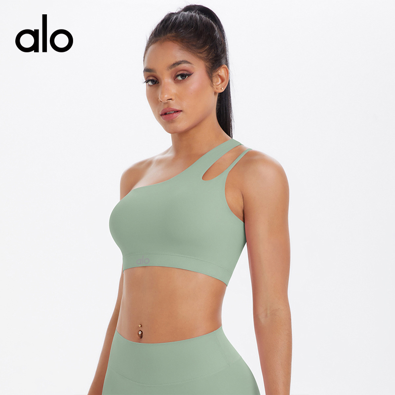 ALO YOGA  💰78💎支持一件代发
aloyoga斜单肩美背裸感运动内衣不规则肩带健身背心
【品牌】ALO 
【款号】BX7114
【面料】锦纶/氨纶
【颜色】板栗色，黑色，徽章蓝，罗勒绿，浅象牙，石墨灰，霜灰色，天空蓝，胭脂红，樱花粉
【尺码】S，M，L，XL
 专柜同款品质，厂家直销，货源充足，售后保障
