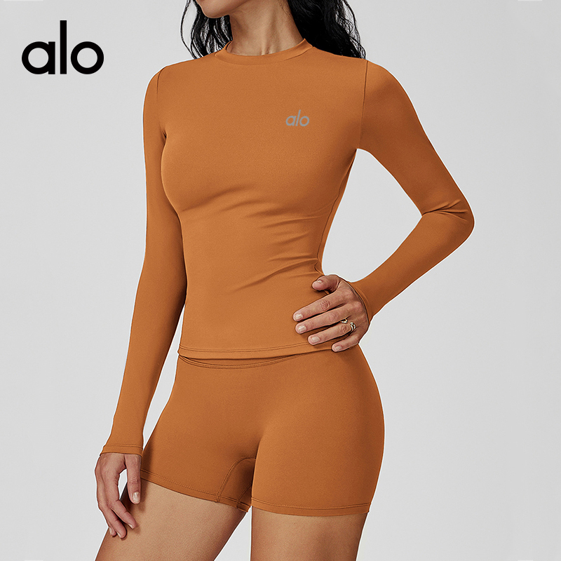 ALO YOGA💰78💎支持一件代发
aloyoga 瑜伽服圆领修身健身服户外跑步运动长袖T恤
【品牌】ALO 
【款号】ECX3101
【面料】锦纶/氨纶
【颜色】高级黑，伯爵橙，海王绿，徽章蓝，酱紫色，摩卡棕，牡丹红，森林绿，树莓红
【尺码】S，M，L，XL
 专柜同款品质，厂家直销，货源充足，售后保障