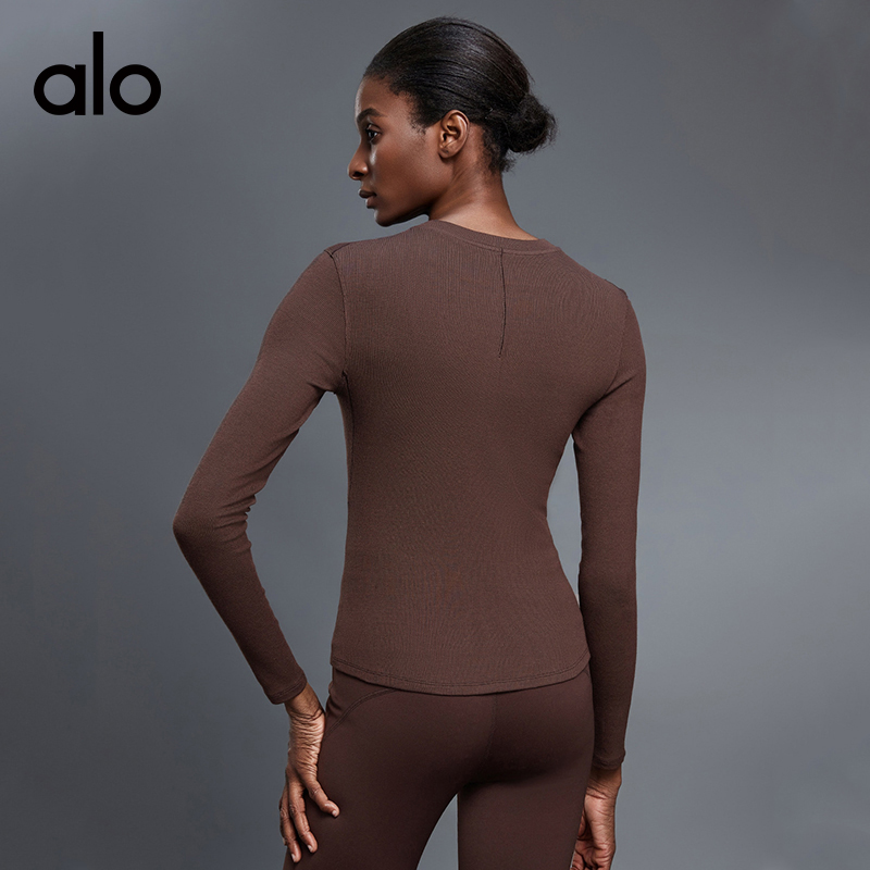 ALO YOGA💰83💎支持一件代发
aloyoga 秋季休闲百搭亨利衫莫代尔亲肤运动健身上衣
【品牌】ALO 
【款号】D25146
【面料】莫代尔/氨纶
【颜色】黑色，骨白，麻花灰，蒸馏咖啡
【尺码】4，6，8，10，12
 专柜同款品质，厂家直销，货源充足，售后保障