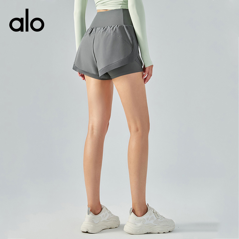 ALO YOGA💰78💎支持一件代发
aloyoga 防走光运动短裤外穿口袋假两件跑步健身短裤
【品牌】ALO 
【款号】DS113
【面料】聚酯纤维/氨纶
【颜色】薄雾玫瑰，烟紫色，雾霾蓝，黑色，雾灰色，可可色，白色
【尺码】S，M，L，XL
 专柜同款品质，厂家直销，货源充足，售后保障