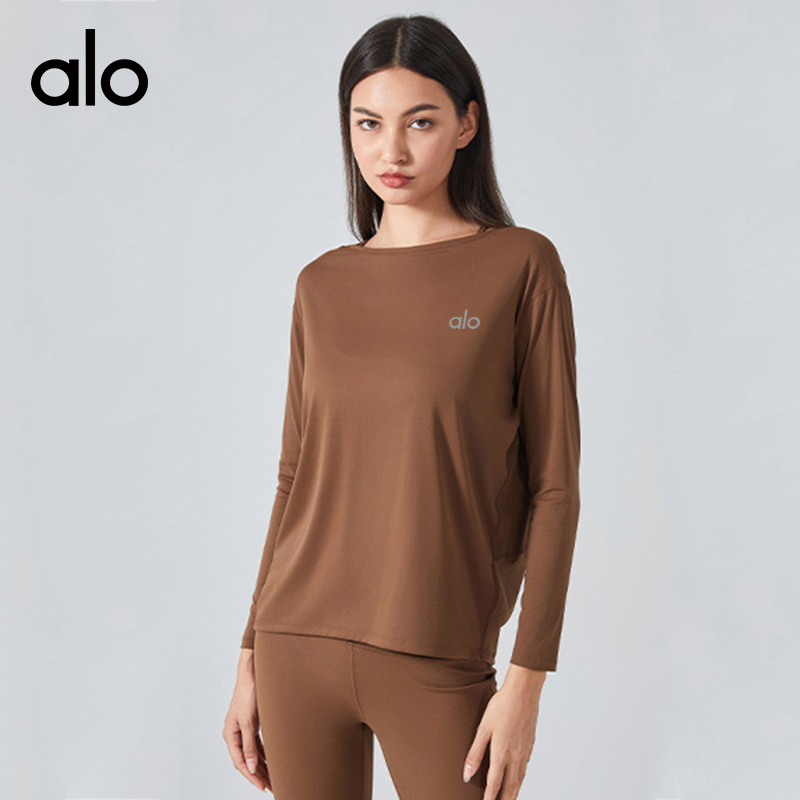 ALO YOGA💰78💎支持一件代发
aloyoga 春季裸感宽松瑜伽长袖透气百搭健身运动上衣
【品牌】ALO 
【款号】DS010
【面料】锦纶/氨纶
【颜色】白色，比利时蓝，藏蓝色，茶棕色，潮水蓝，黑色，灰褐色，焦橙色，金菊黄，烤棕色，林灰绿，浅粉芍药，亚麻色，玉石白
【尺码】4，6，8，10，12
 专柜同款品质，厂家直销，货源充足，售后保障