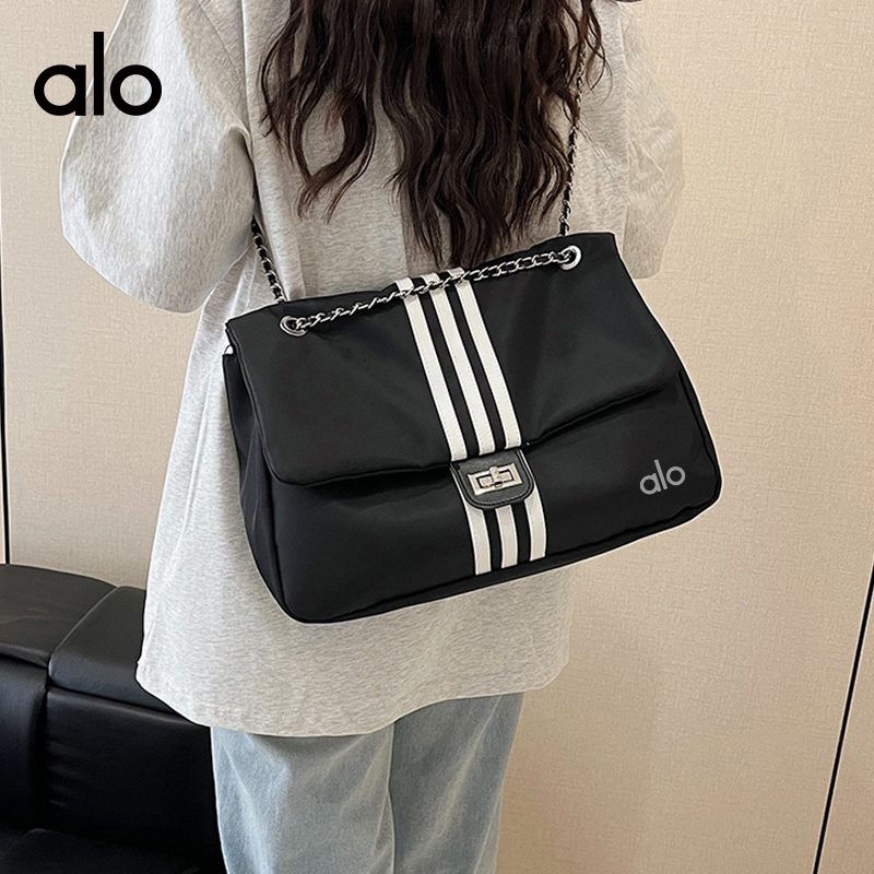 ALO YOGA 💰68💎支持一件代发
aloyoga 休闲通勤大容量尼龙布大包包新款时尚单肩包
【品牌】AlO
【款号】STB3174
【面料】尼龙
【颜色】黑色
【尺码】均码
 专柜同款品质，厂家直销，货源充足，售后保障