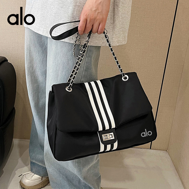 ALO YOGA 💰68💎支持一件代发
aloyoga 休闲通勤大容量尼龙布大包包新款时尚单肩包
【品牌】AlO
【款号】STB3174
【面料】尼龙
【颜色】黑色
【尺码】均码
 专柜同款品质，厂家直销，货源充足，售后保障