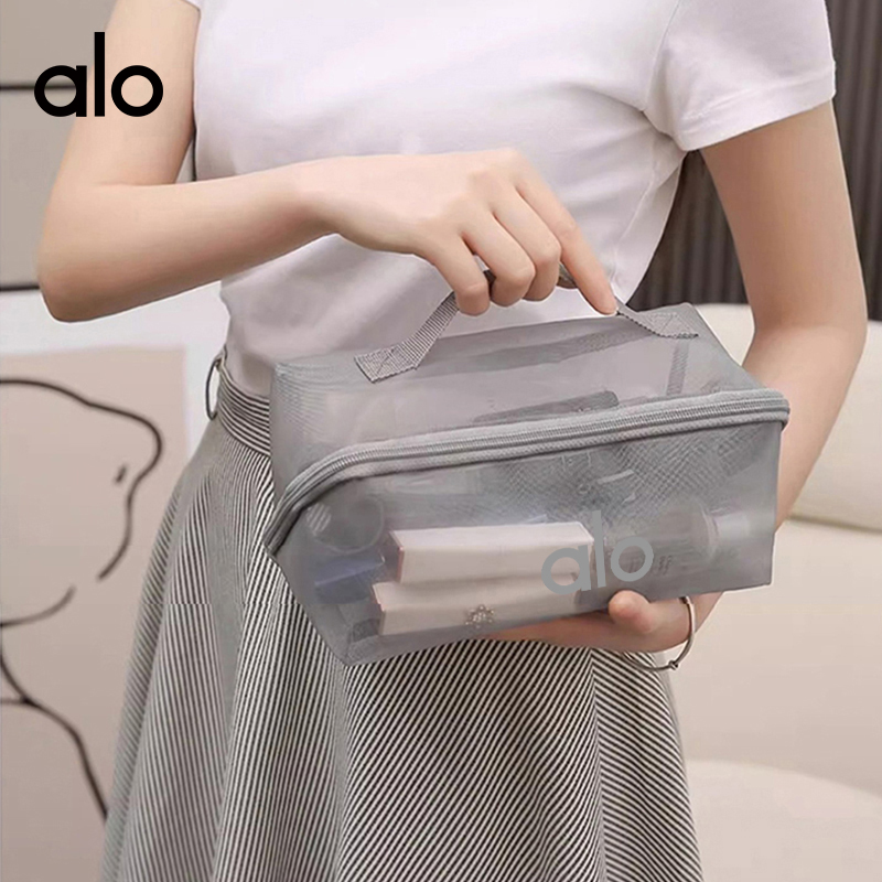 ALO YOGA💰63💎支持一件代发
aloyoga 新款网纱短途旅行洗水用品收纳包化妆品收纳包
【品牌】ALO 
【款号】STB2085
【面料】网纱
【颜色】黑色，灰色
【尺码】均码
 专柜同款品质，厂家直销，货源充足，售后保障