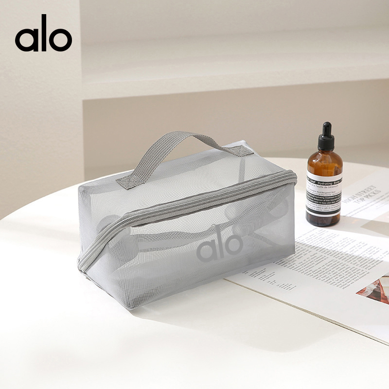 ALO YOGA💰63💎支持一件代发
aloyoga 新款网纱短途旅行洗水用品收纳包化妆品收纳包
【品牌】ALO 
【款号】STB2085
【面料】网纱
【颜色】黑色，灰色
【尺码】均码
 专柜同款品质，厂家直销，货源充足，售后保障