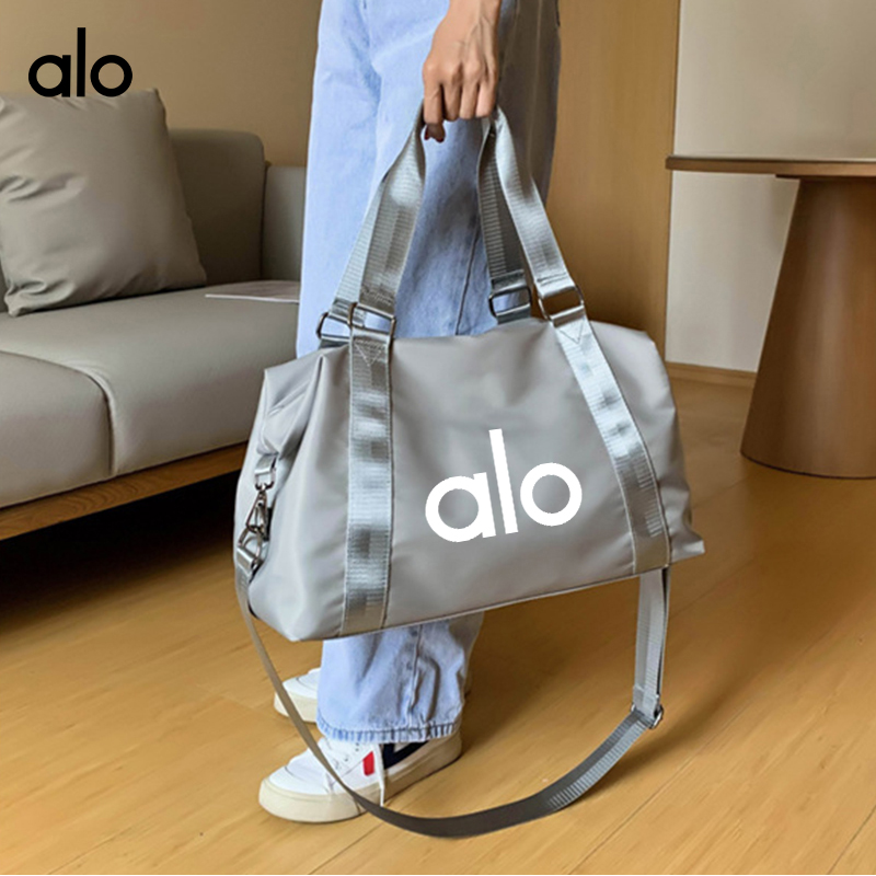 ALO YOGA 💰76💎支持一件代发
aloyoga 健身手提包跨境干湿分离大容量运动包防水多功能旅行包
【品牌】AlO
【款号】JY23包包
【面料】尼龙
【颜色】黑色，深蓝色，浅紫色，浅灰色，粉色，浅绿色
【尺码】均码
 专柜同款品质，厂家直销，货源充足，售后保障