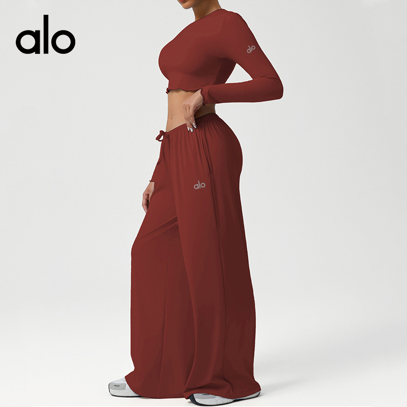 ALO YOGA💰143💎支持一件代发
aloyoga 运动宽松垂感阔腿裤瑜伽服修身长袖上衣健身套装
【品牌】ALO 
【款号】TZ2551
【面料】锦纶/氨纶
【颜色】冰蓝色，紫红色，浅黄色，玫瑰粉，黑色，褐色
【尺码】S，M，L，XL
 专柜同款品质，厂家直销，货源充足，售后保障