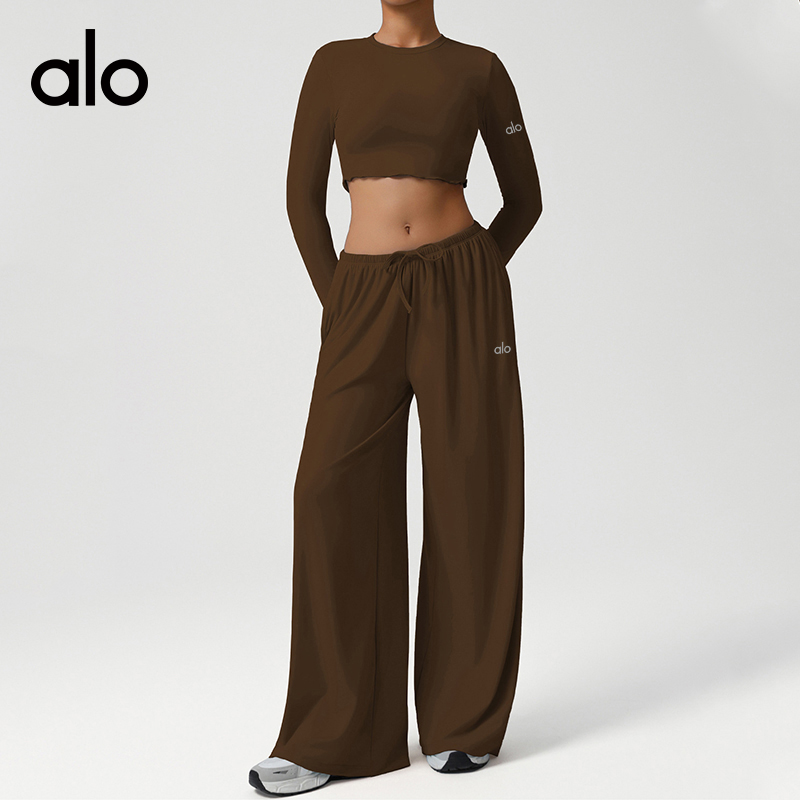 ALO YOGA💰143💎支持一件代发
aloyoga 运动宽松垂感阔腿裤瑜伽服修身长袖上衣健身套装
【品牌】ALO 
【款号】TZ2551
【面料】锦纶/氨纶
【颜色】冰蓝色，紫红色，浅黄色，玫瑰粉，黑色，褐色
【尺码】S，M，L，XL
 专柜同款品质，厂家直销，货源充足，售后保障