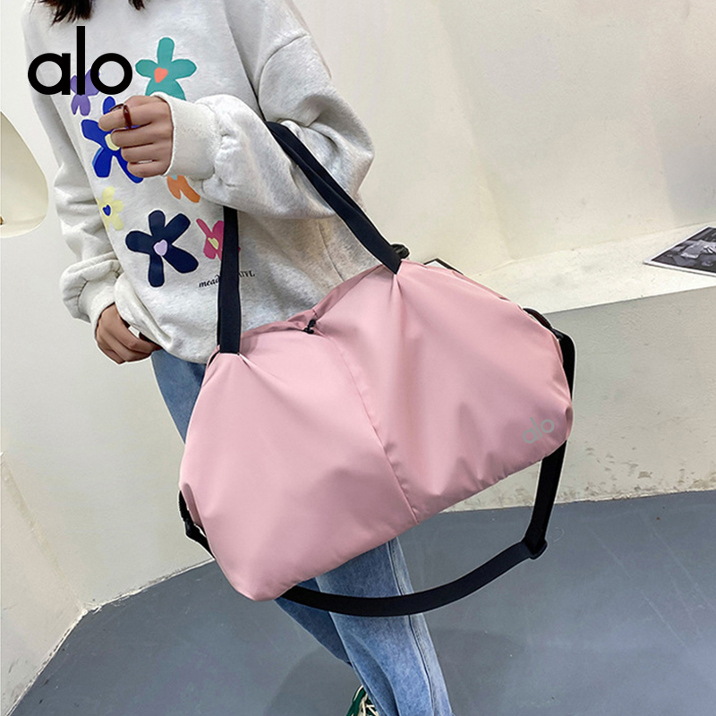 ALO YOGA💰78💎支持一件代发
aloyoga 健身休闲瑜伽包干湿分离短途旅行包单肩运动包
【品牌】ALO 
【款号】STB708
【面料】牛津布
【颜色】暗黑色，薄荷绿，迷雾蓝，甜蜜粉，香芋紫，樱花粉
【尺码】均码
 专柜同款品质，厂家直销，货源充足，售后保障