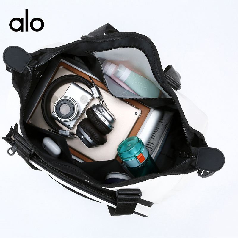 ALO YOGA💰78💎支持一件代发
aloyoga 大容量手提单肩旅行袋网球包时尚运动健身包
【品牌】ALO 
【款号】STB336
【面料】牛津布
【颜色】黑色，米白色
【尺码】均码
 专柜同款品质，厂家直销，货源充足，售后保障