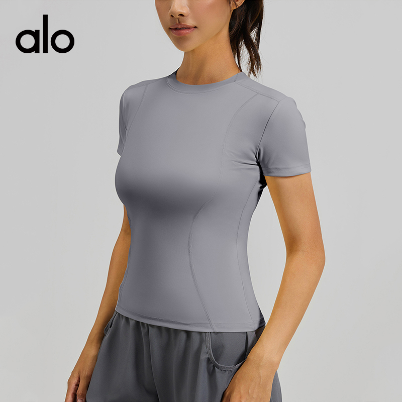 ALO YOGA💰68💎支持一件代发
aloyoga 薄款运动紧身瑜伽服短袖上衣女跑步健身T恤
【品牌】ALO 
【款号】MTDX40
【面料】聚酯纤维/氨纶
【颜色】豆沙粉，海岩灰，灰湖蓝，酱茄紫，梅浆红，天青色，香鲸蓝，象牙白，星耀黑，阳光黄，昌荣紫
【尺码】S，M，L，XL，2XL，3XL
 专柜同款品质，厂家直销，货源充足，售后保障