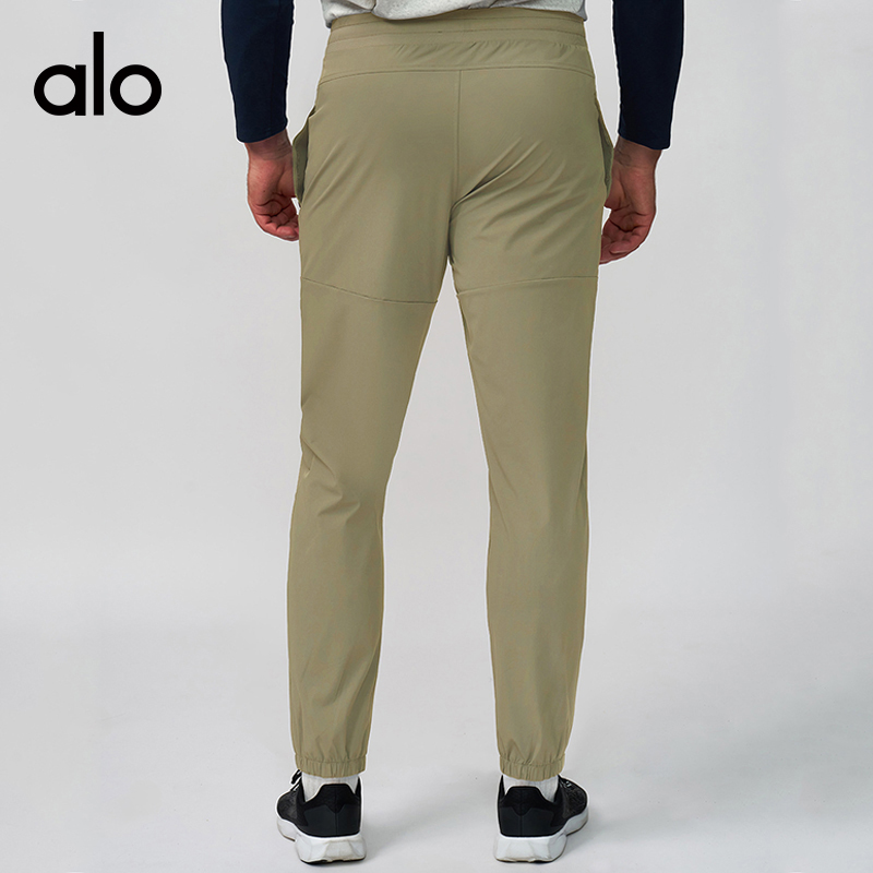 ALO YOGA💰108💎支持一件代发
aloyoga 男士运动速干透气束脚长裤高尔夫户外徒步休闲裤
【品牌】ALO 
【款号】ECK1138
【面料】锦纶/氨纶
【颜色】高级黑，深灰色，中杏色，蓝雾色
【尺码】S，M，L，XL，XXL
 专柜同款品质，厂家直销，货源充足，售后保障