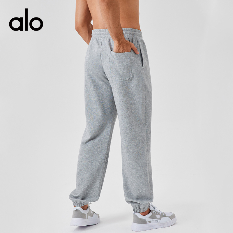 ALO YOGA💰103💎支持一件代发
aloyoga 男士运动长裤宽松运动休闲卫裤跑步训练健身裤
【品牌】ALO 
【款号】CK41521
【面料】棉/涤纶/氨纶
【颜色】卡其棕，浅驼色，黑色，花灰色
【尺码】S，M，L，XL，XXL
 专柜同款品质，厂家直销，货源充足，售后保障