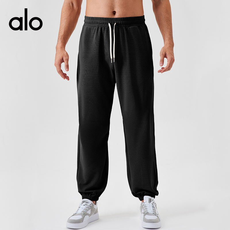 ALO YOGA💰103💎支持一件代发
aloyoga 男士运动长裤宽松运动休闲卫裤跑步训练健身裤
【品牌】ALO 
【款号】CK41521
【面料】棉/涤纶/氨纶
【颜色】卡其棕，浅驼色，黑色，花灰色
【尺码】S，M，L，XL，XXL
 专柜同款品质，厂家直销，货源充足，售后保障