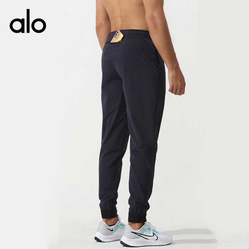 ALO YOGA💰83💎支持一件代发
aloyoga 男士运动裤宽松速干梭织健身裤弹力休闲长裤
【品牌】ALO 
【款号】CK70001
【面料】锦纶/氨纶
【颜色】藏青色，黑色，灰色
【尺码】S，M，L，XL，XXL
 专柜同款品质，厂家直销，货源充足，售后保障