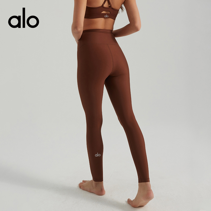 ALO YOGA  💰156💎支持一件代发
aloyoga 裸感珠光高强度交叉美背高腰瑜伽裤运动套装
JY4012背心：78
JY88301长裤：78
【品牌】ALO 
【款号】JY4012+JY88301
【面料】锦纶/氨纶
【颜色】烟灰色，兰色，黑色，美拉德棕，青铜绿，白色
【尺码】XS/4，S/6，M/8，L/10，XL/12
 专柜同款品质，厂家直销，货源充足，售后保障