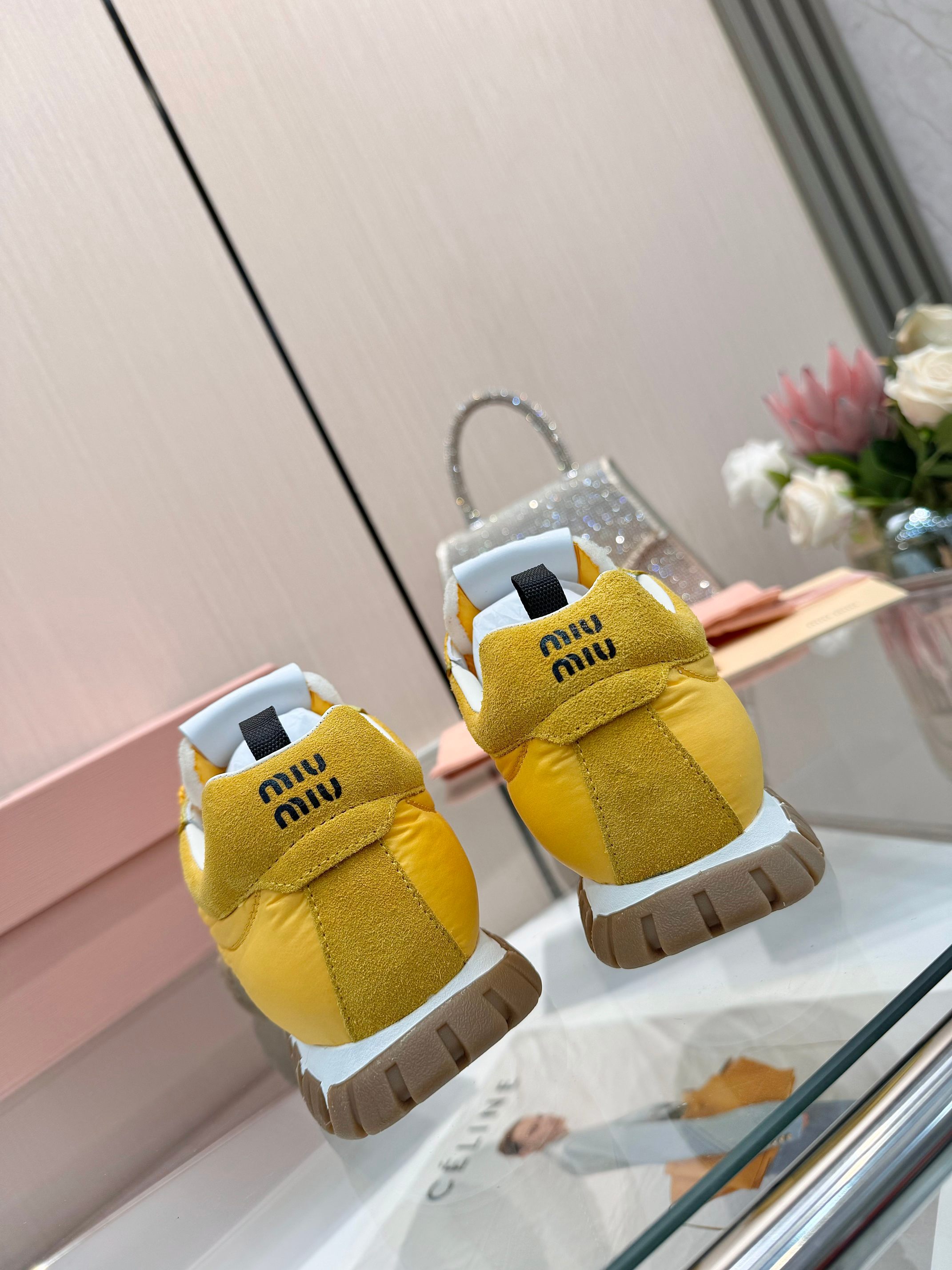 Miu Miu Women's Yellow Quilted Low-Top Sneakers With Jewel Accents 3 a1741244636382 3656