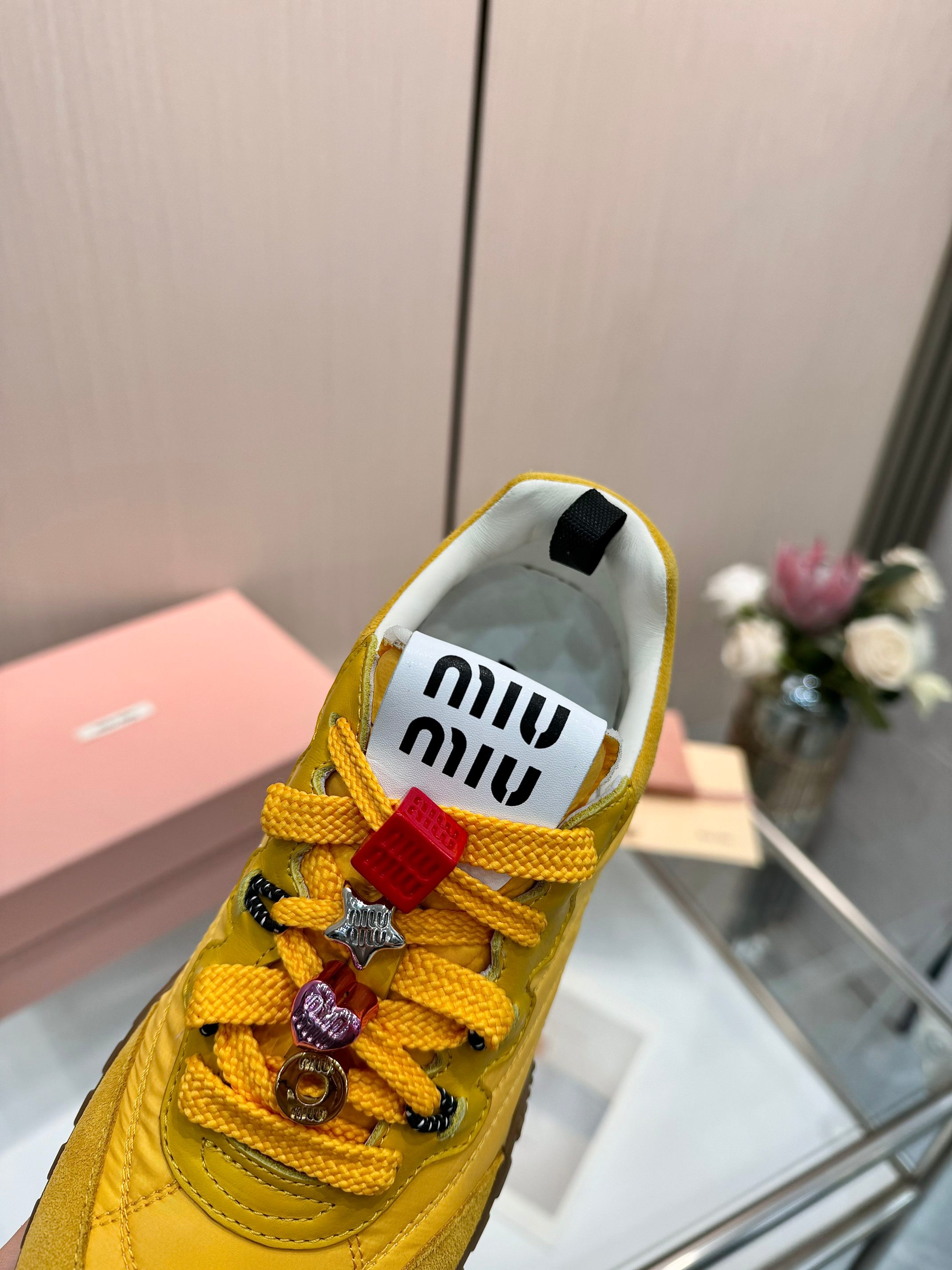 Miu Miu Women's Yellow Quilted Low-Top Sneakers With Jewel Accents 2 a1741244636398 8218
