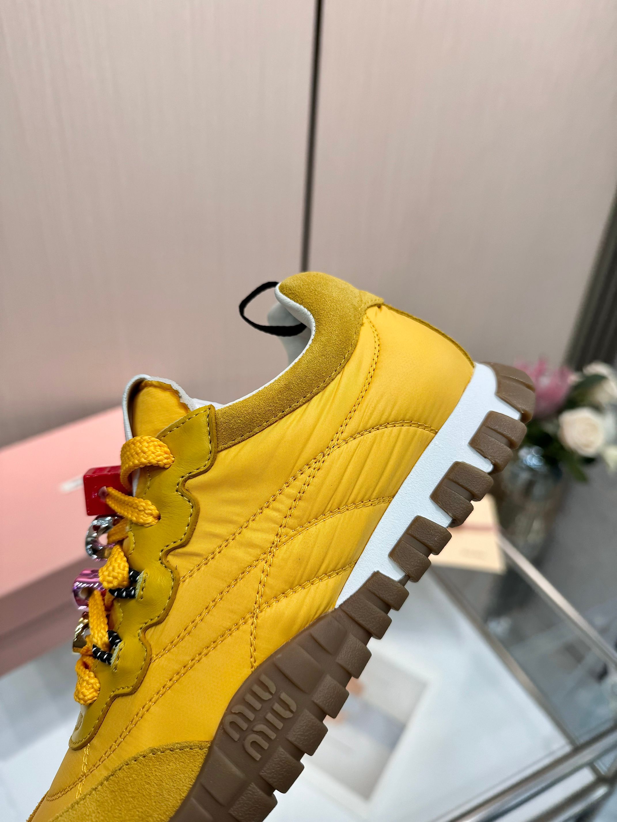 Miu Miu Women's Yellow Quilted Low-Top Sneakers With Jewel Accents 9 a1741244665255 6880
