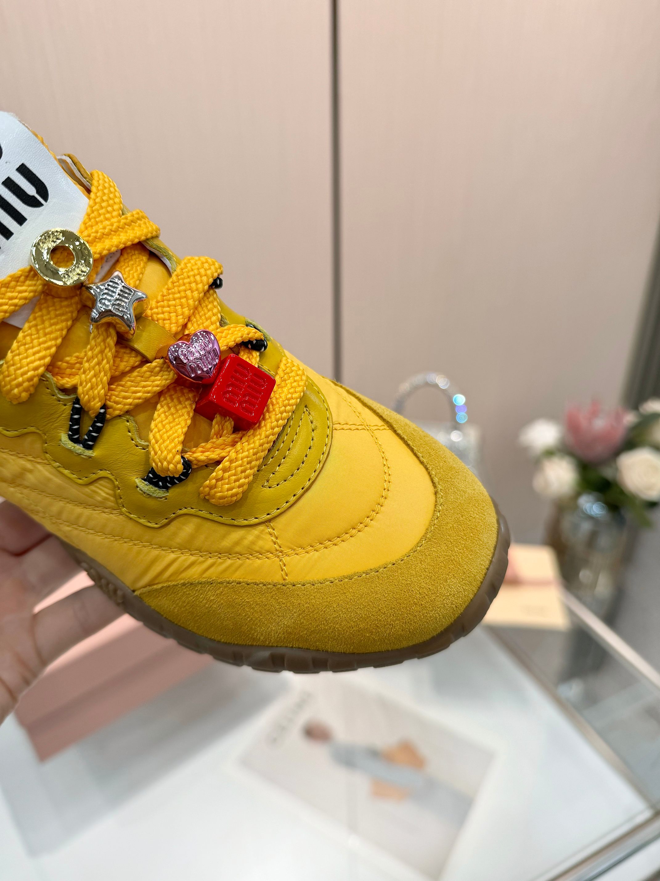Miu Miu Women's Yellow Quilted Low-Top Sneakers With Jewel Accents 6 a1741244665350 4061