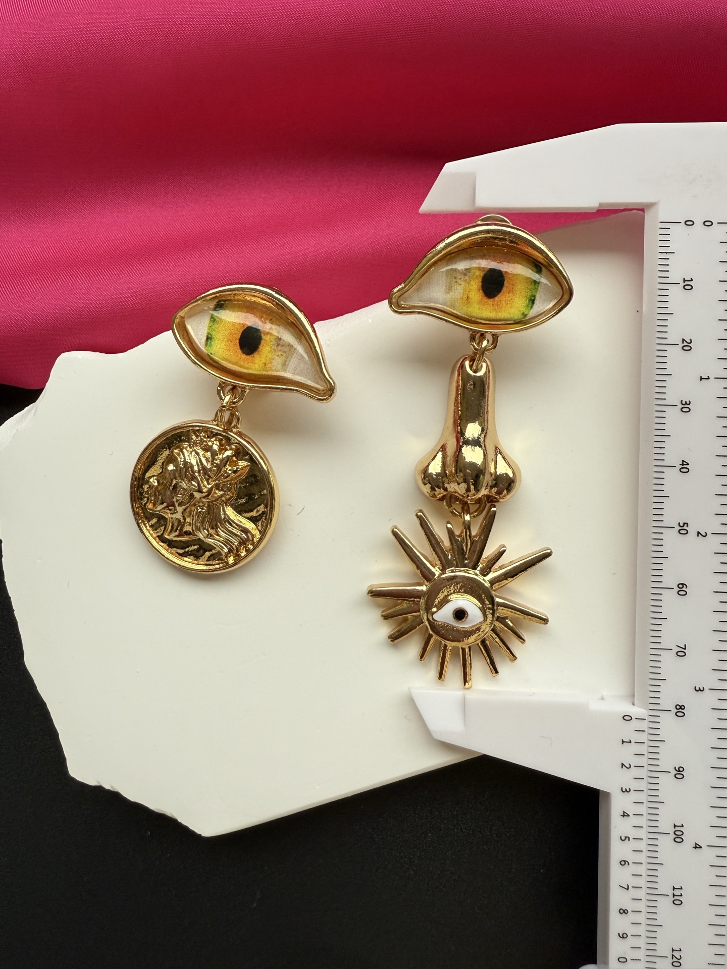 Серьги Schiaparelli с глазами и солнцем