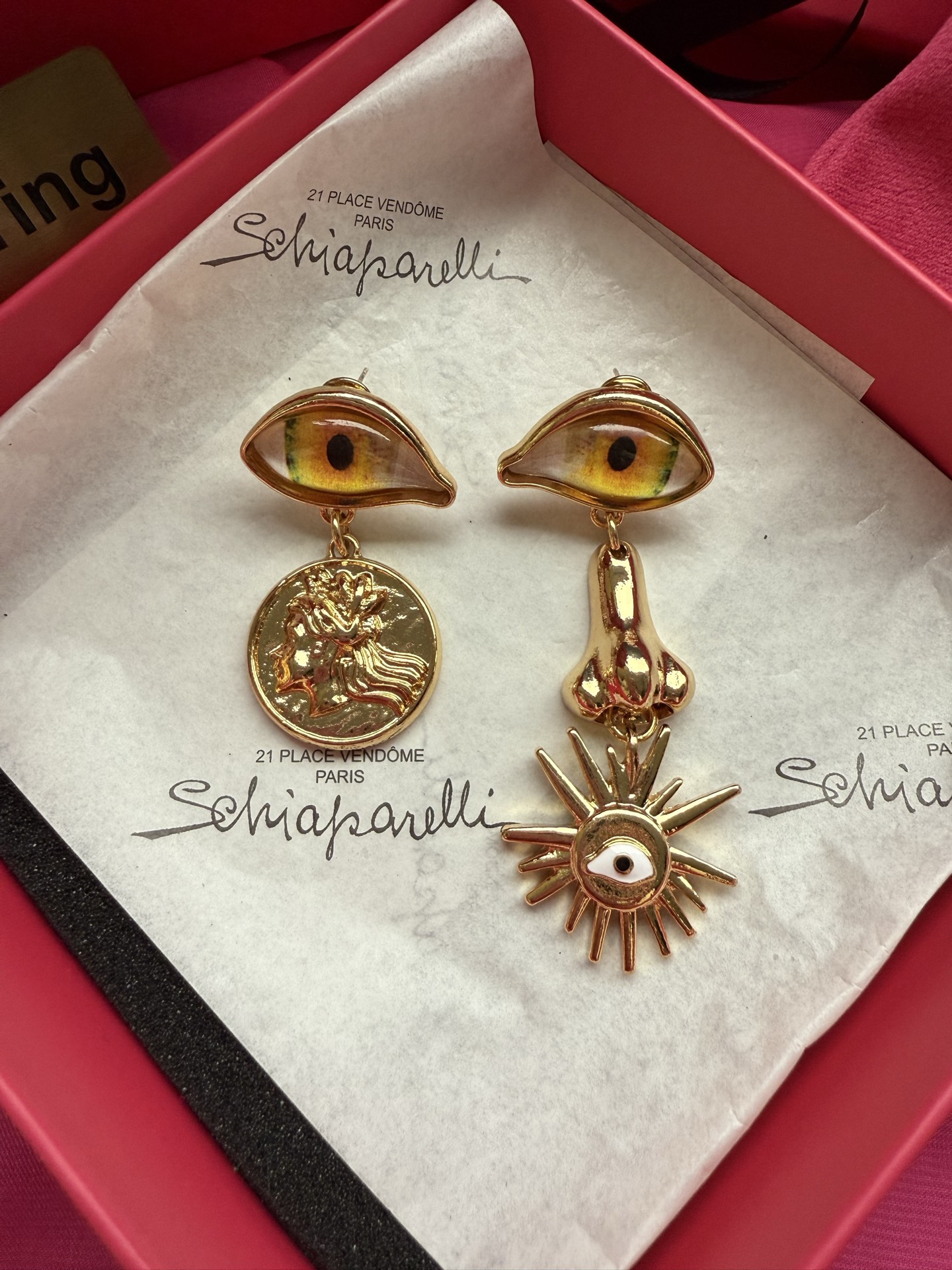 Серьги Schiaparelli с глазами и солнцем