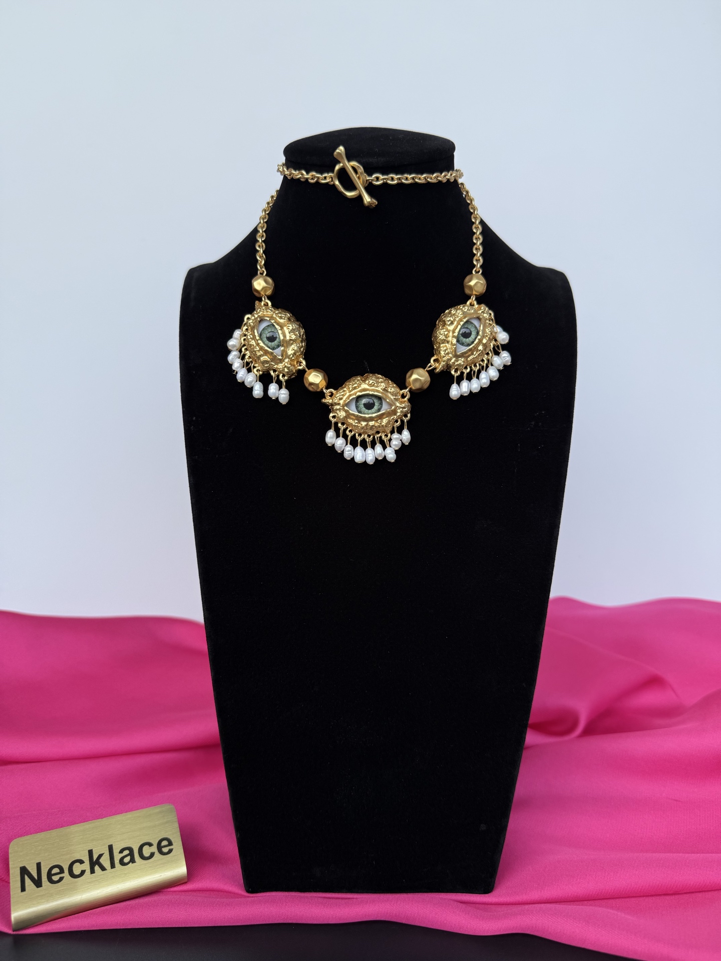 Колье с глазами и бусинами Schiaparelli