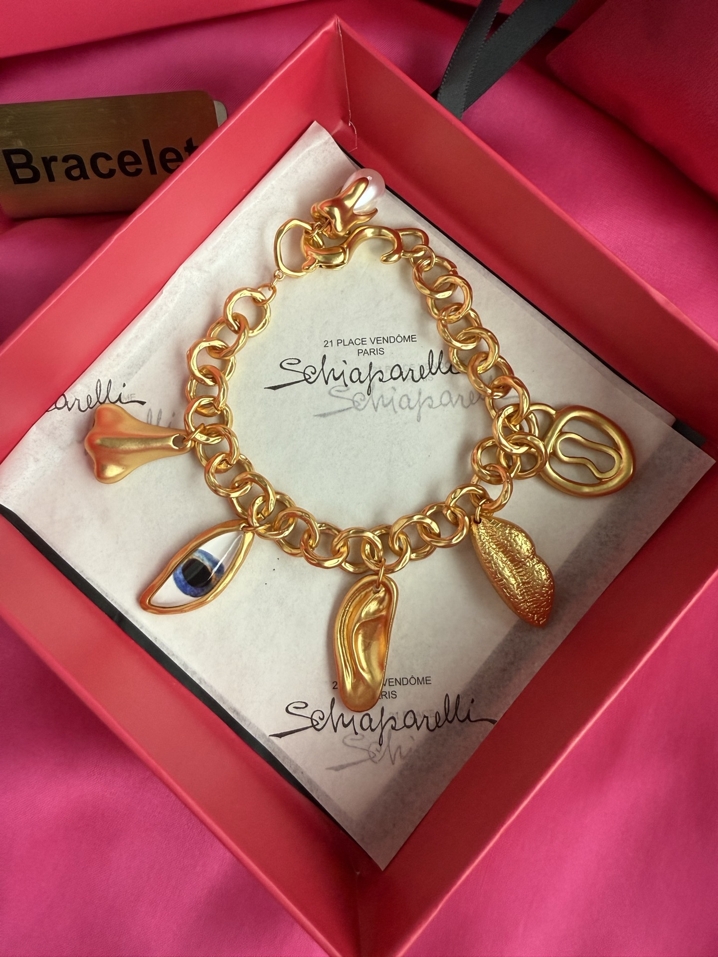 Браслет Schiaparelli с подвесками