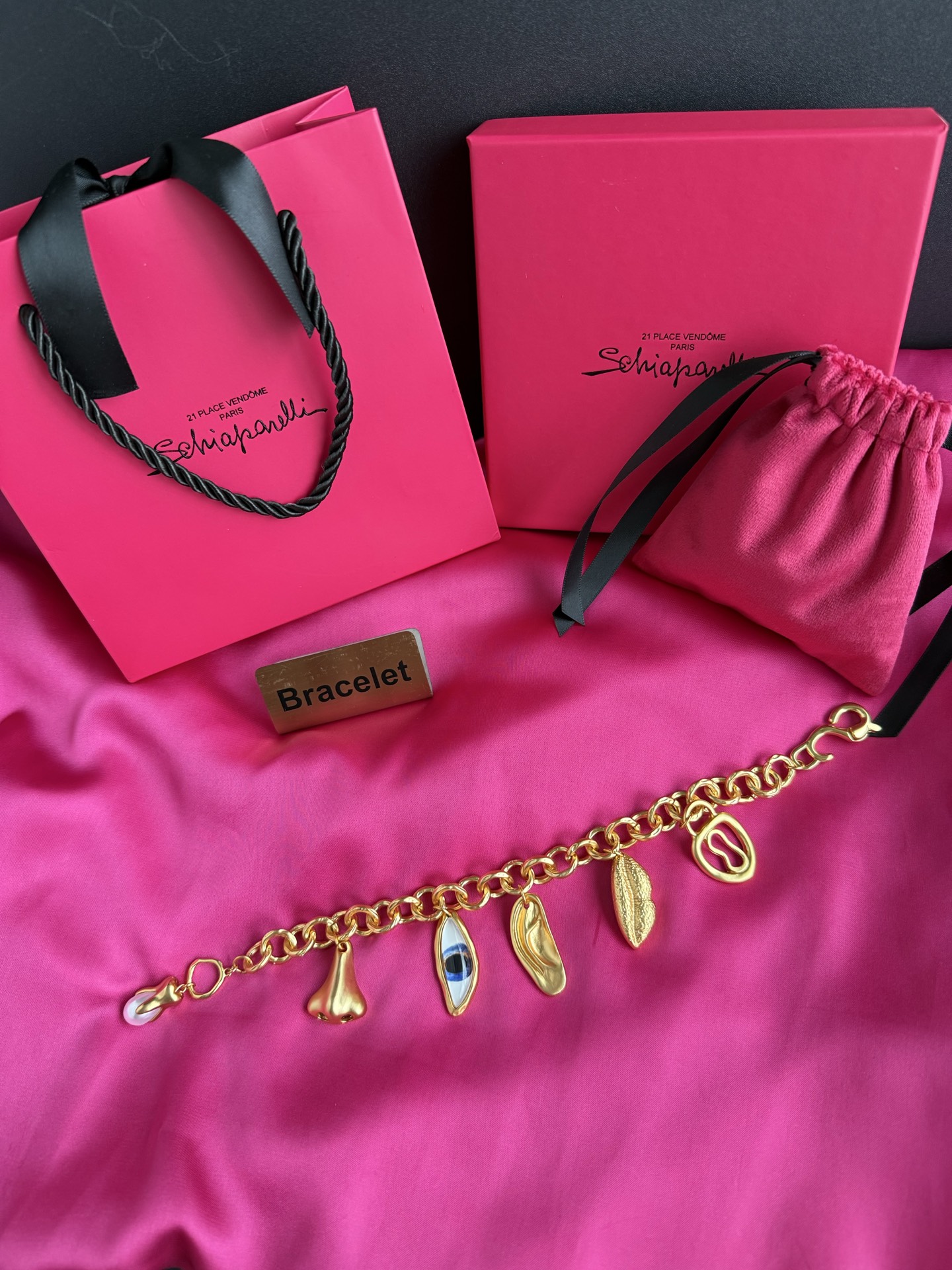 Браслет Schiaparelli с подвесками