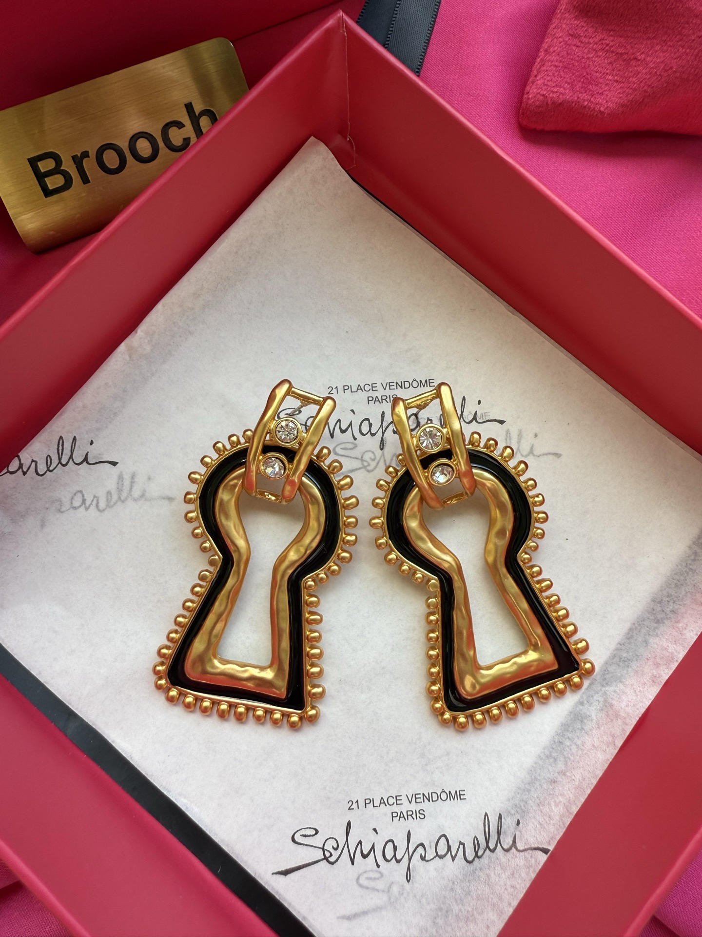 Серьги в форме ключа Schiaparelli