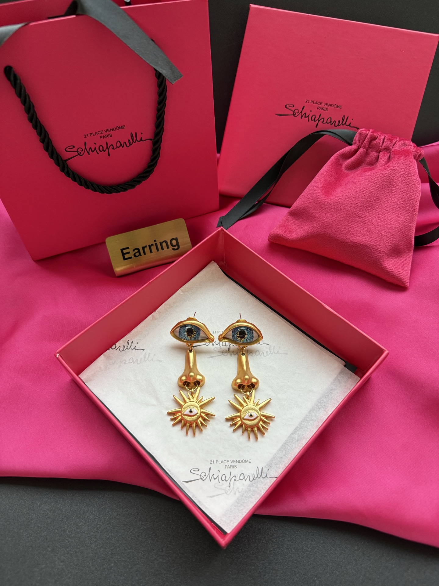 Серьги Schiaparelli с глазами и солнцем