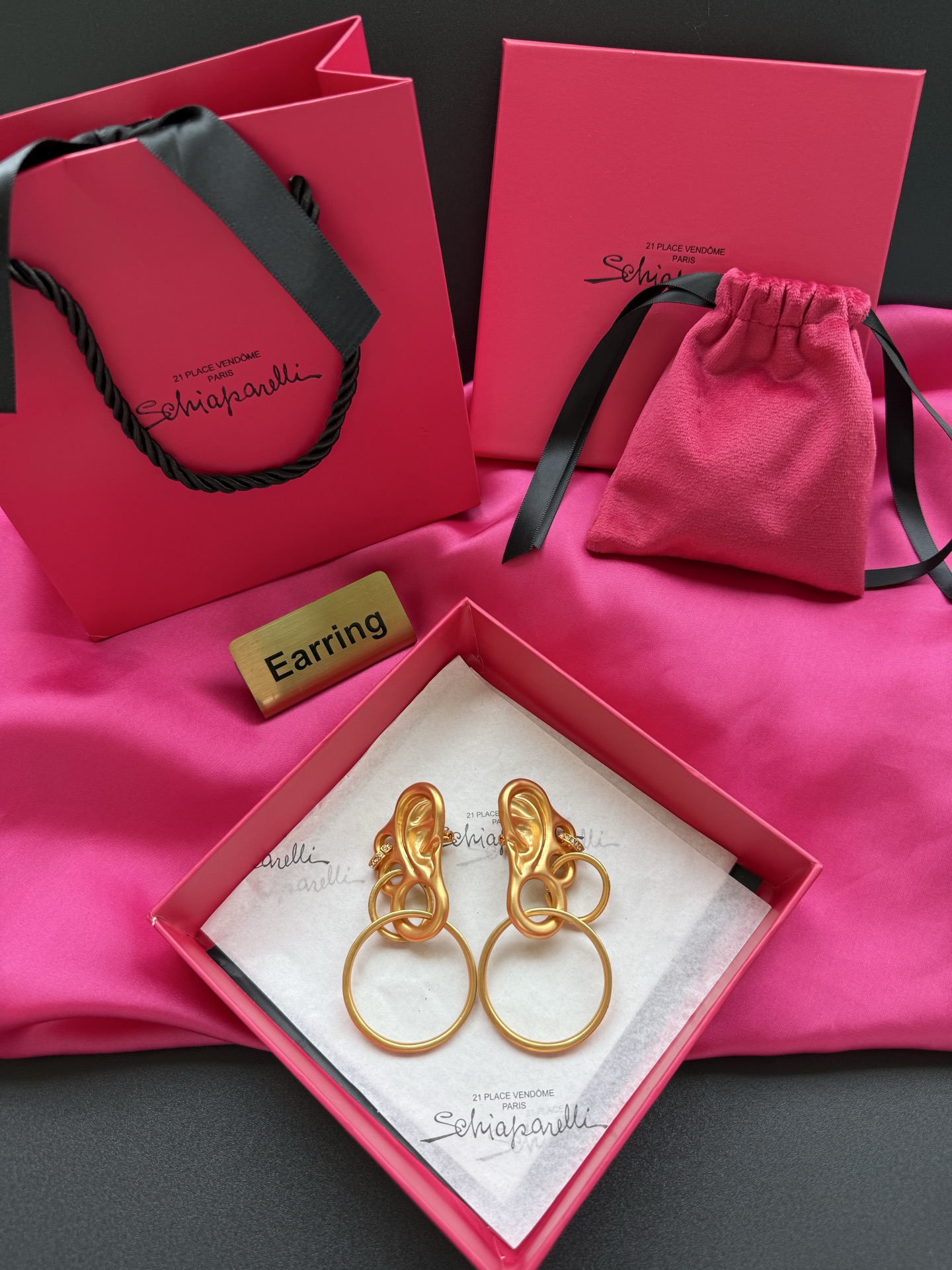 Серьги в форме уха с кольцами Schiaparelli