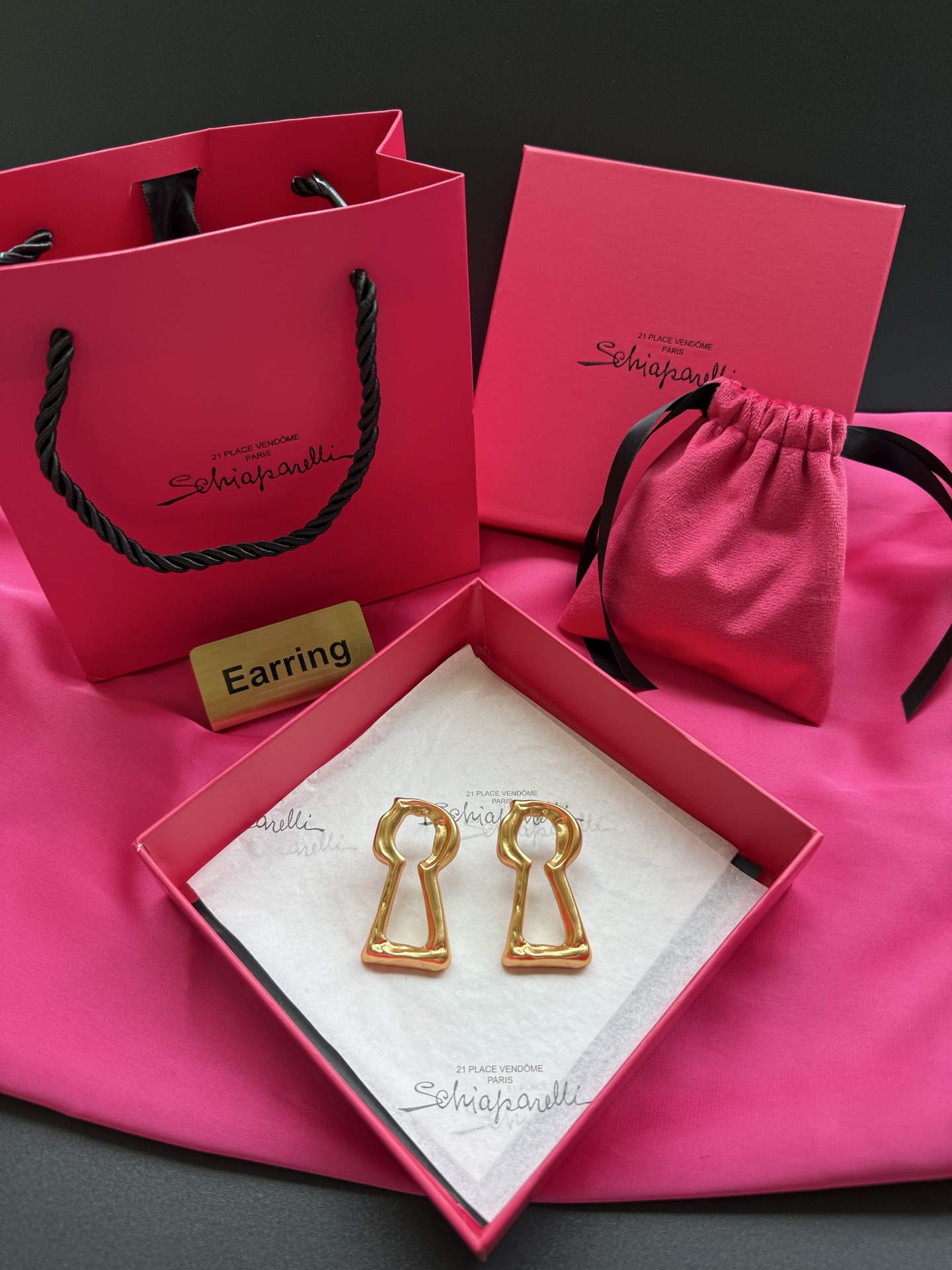 Серьги в форме ключа Schiaparelli